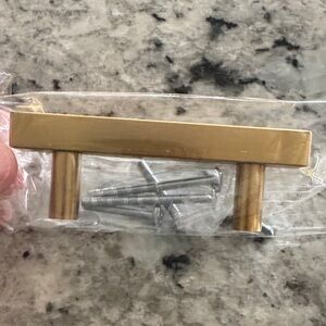 **DONATED** 
Gold Cabinet Handle with Screws